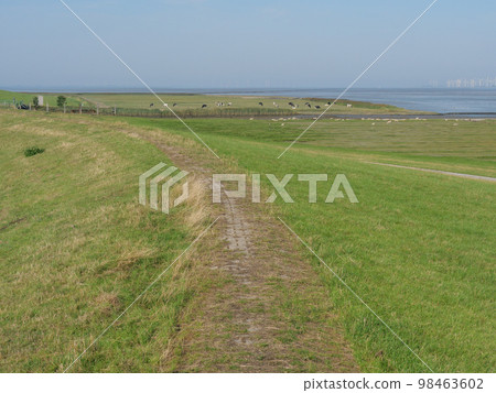 the village of ditzum at the ems river 98463602