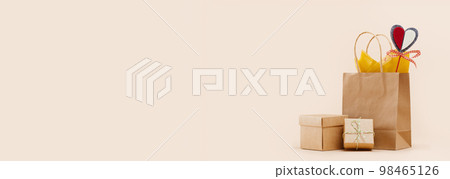 Fall Gift or Sale concept. Shopping paper bag, with gift boxes mockup red felt heart Valentines day tag. Copy space. Thanksgiving. Packaging. Box order delivery. Thank you Fall Gift or Sale concept. Shopping paper bag, with gift boxes mockup red felt heart Valentines day tag. Copy space. Thanksgiving. Packaging. Box order delivery. Thank you 98465126