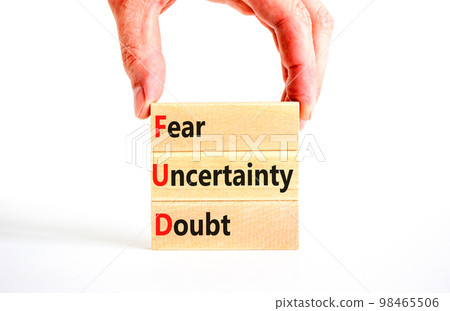 FUD fear uncertainty doubt symbol. Concept words FUD fear uncertainty doubt on wooden blocks on a beautiful white table white background. Business and FUD fear uncertainty doubt concept. Copy space. FUD fear uncertainty doubt symbol. Concept words FUD fear uncertainty doubt on wooden blocks on a beautiful white table white background. Business and FUD fear uncertainty doubt concept. Copy space. 98465506