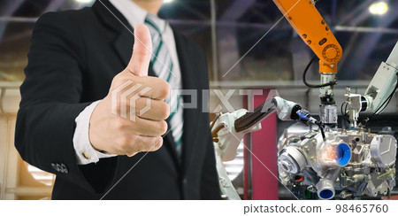 Businessman thumbs up industrial technology and construction Businessman thumbs up industrial technology and construction 98465760