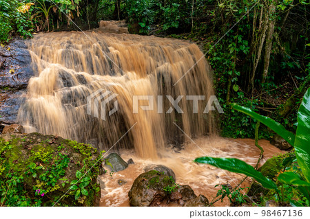 waterfall with rain water in the rain forest 98467136