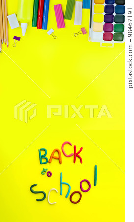 banner letters made of multi-colored plasticine back to school in funny style on yellow background banner letters made of multi-colored plasticine back to school in funny style on yellow background 98467191