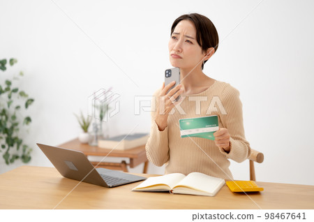 Passbook woman smartphone worries 98467641