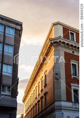 Old residential buildings in central Madrid at sunset 98468329