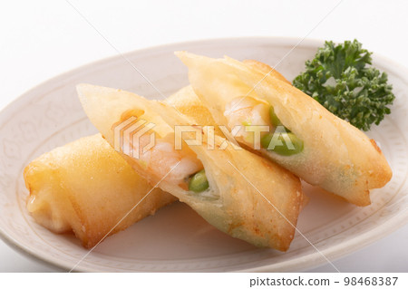 Cheese spring rolls with shrimp and edamame 98468387