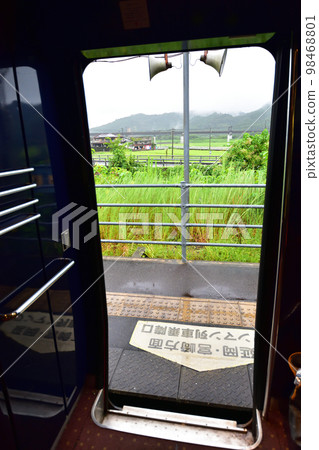 A rainy morning in the summer of 2022, scenery from the train window from Saiki Station to Nobeoka Station on the Nippo Main Line A rainy morning in the summer of 2022, scenery from the train window from Saiki Station to Nobeoka Station on the Nippo Main Line 98468801