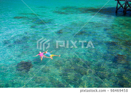 Kids snorkel. Children snorkeling in tropical sea. Kids snorkel. Children snorkeling in tropical sea. 98469458