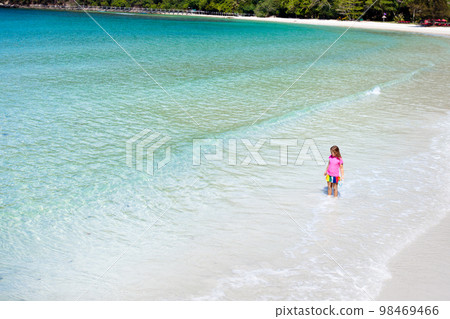 Child on beach vacation. Kids on tropical island. 98469466