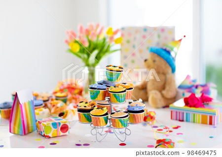 Cupcakes for kids birthday, child jungle party. 98469475