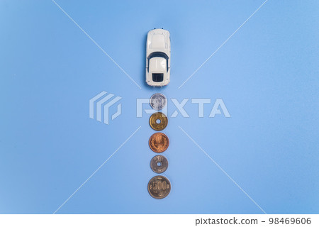 Gasoline car worried about fuel consumption Gasoline car worried about fuel consumption 98469606