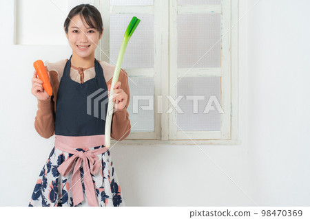 carrot green onion woman carrot green onion woman 98470369