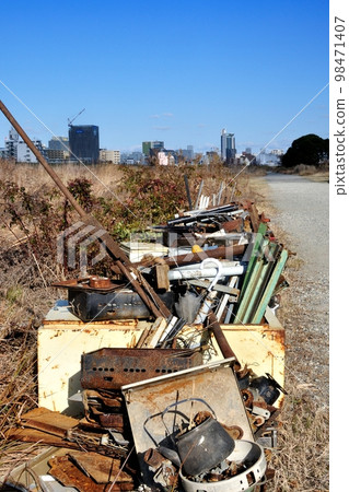 Illegal dumping of riverbed Illegal dumping of riverbed 98471407