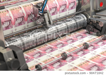 Printing money United Kingdom pound bills on a print machine in typography.. Finance, tax, stock market and investment, making money concept. Printing money United Kingdom pound bills on a print machine in typography.. Finance, tax, stock market and investment, making money concept. 98471842