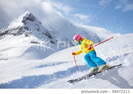 Kids ski. Winter family snow sport. Child skiing Kids ski. Winter family snow sport. Child skiing 98472211
