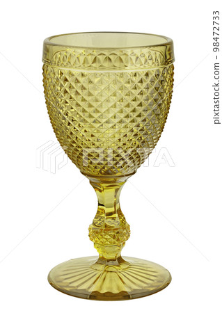 Stemware. Beautiful empty wine glass isolated on white background. Christmas coloured glass. 98472733