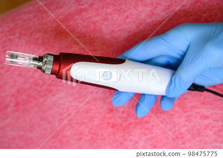 Cosmetology device for dermapen mesotherapy close-up. Cosmetology device for dermapen mesotherapy close-up. 98475775