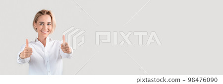 Highly Recommended. Wide Banner With Cheerful Businesswoman Showing Thumbs Up At Camera 98476090
