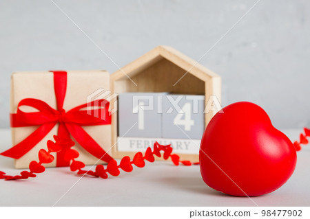 Valentine Day theme with wooden block calendar. Greeting card template for Valentines Day copy space for text 98477902