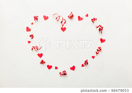 red heart shape on colored background. minimal concept top view with copy space red heart shape on colored background. minimal concept top view with copy space 98479053