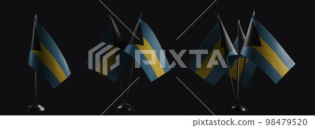 Small national flags of the Bahamas on a black background 98479520