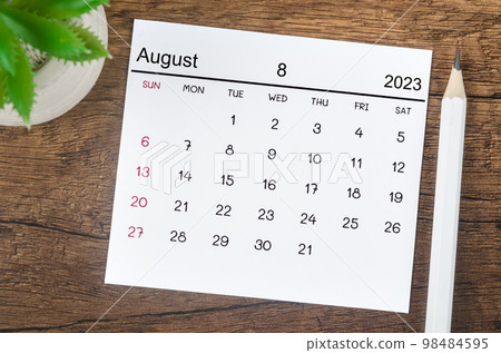 The August 2023 Monthly calendar for 2023 year with pen on wooden background. The August 2023 Monthly calendar for 2023 year with pen on wooden background. 98484595