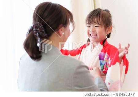 A girl wearing a Shichigosan kimono A girl wearing a Shichigosan kimono 98485377