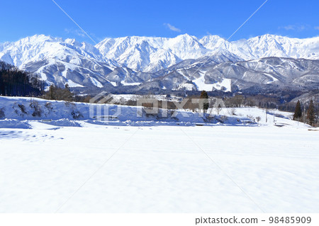 Hakuba in winter, sunny Northern Alps seen from Nodaira 98485909