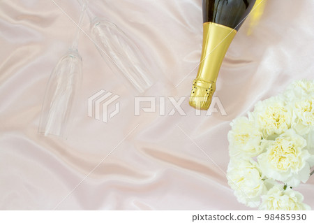 Valentine day concept, Champagne with glass and white peony on table cloth for diner 98485930