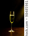 Champagne with party concept, Glass of champagne on wooden table over black background 98485981