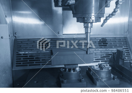 The CNC milling machine rough cutting the graphite electrode parts with solid ball end mill. The CNC milling machine rough cutting the graphite electrode parts with solid ball end mill. 98486551