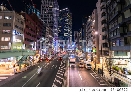 "Tokyo" Night view of Shibuya station and office district 98486772