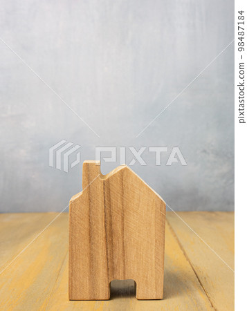 The wood home for building or property concept. The wood home for building or property concept. 98487184