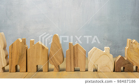 The wood home for building or property concept. The wood home for building or property concept. 98487186