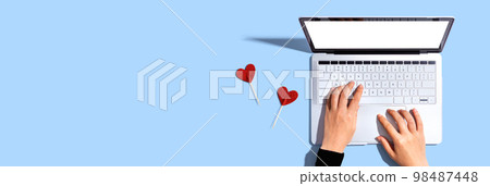 Laptop computer with heart cushions 98487448