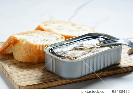 canned oil sardines and baguette 98488453