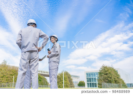 The back view of an engineer making a patrol The back view of an engineer making a patrol 98488989
