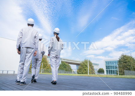 The back view of an engineer making a patrol 98488990