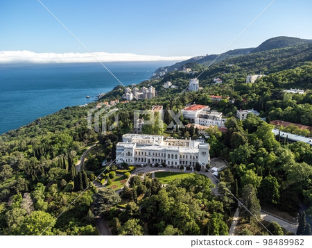 Aerial View of Livadia Palace - located on the shores of the Black Sea in the village of Livadia in the Yalta region of Crimea. Livadia Palace was a summer retreat of the last Russian tsar Nicholas II Aerial View of Livadia Palace - located on the shores of the Black Sea in the village of Livadia in the Yalta region of Crimea. Livadia Palace was a summer retreat of the last Russian tsar Nicholas II 98489982
