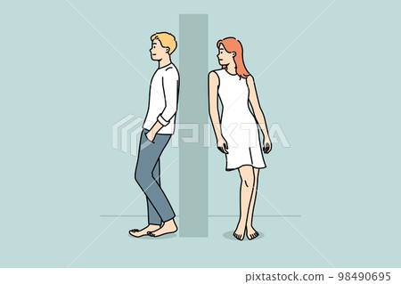 Man and woman separated by wall Man and woman separated by wall 98490695