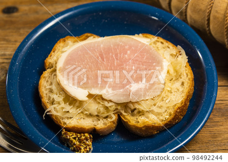 Ham and sauerkraut open sandwich 98492244