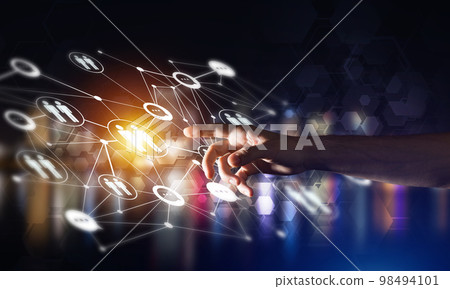 Creating modern wireless technologies as means of communucation and networking on dark background Creating modern wireless technologies as means of communucation and networking on dark background 98494101
