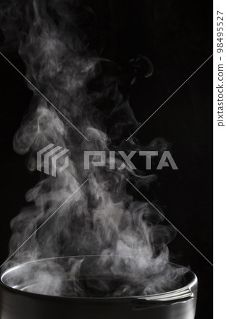 Synthetic material of steam Image of the steam of cooking in a pot 98495527
