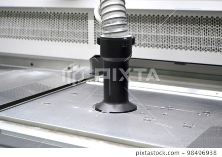 Powder part of 3d printer. Process of pouring polyamide powder through hose into working chamber of 3D printer for printing. Industrial equipment Modern 3D printing additive progressive technology MJF Powder part of 3d printer. Process of pouring polyamide powder through hose into working chamber of 3D printer for printing. Industrial equipment Modern 3D printing additive progressive technology MJF 98496938