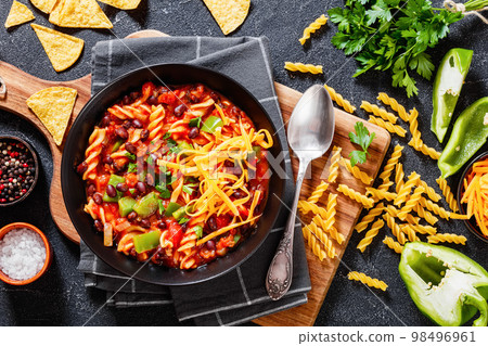 Black Bean Soup with spiral pasta and vegetables Black Bean Soup with spiral pasta and vegetables 98496961