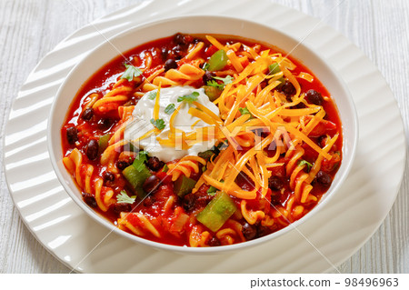 Black Bean Soup with spiral pasta and vegetables Black Bean Soup with spiral pasta and vegetables 98496963