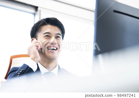 Business smartphone call conversation smile male Business smartphone call conversation smile male 98497241