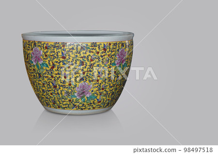 antique yellow and white ceramic large pot on grey background, object, decor, modern, gift, copy space antique yellow and white ceramic large pot on grey background, object, decor, modern, gift, copy space 98497518