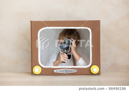 Child pretend to be a director Child pretend to be a director 98498186