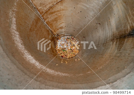 cleaning coffee fruits from husks on the farm 98499714