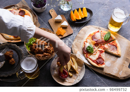 Table for pizza and beer 98499732